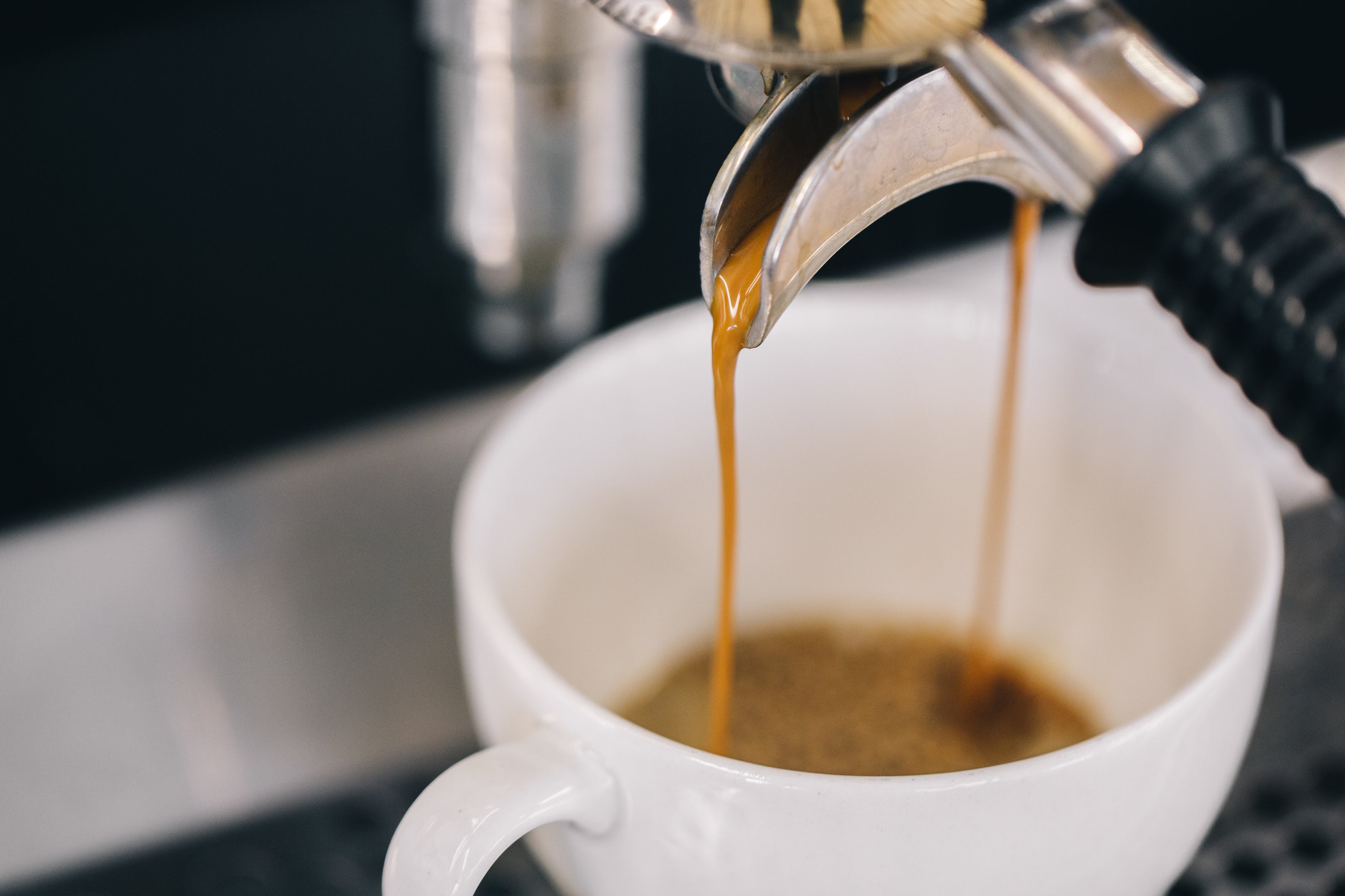 double espresso pull in a white cup